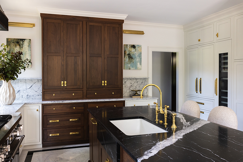 View from the kitchen into the butler's pantry, highlighting the seamless transition of materials.