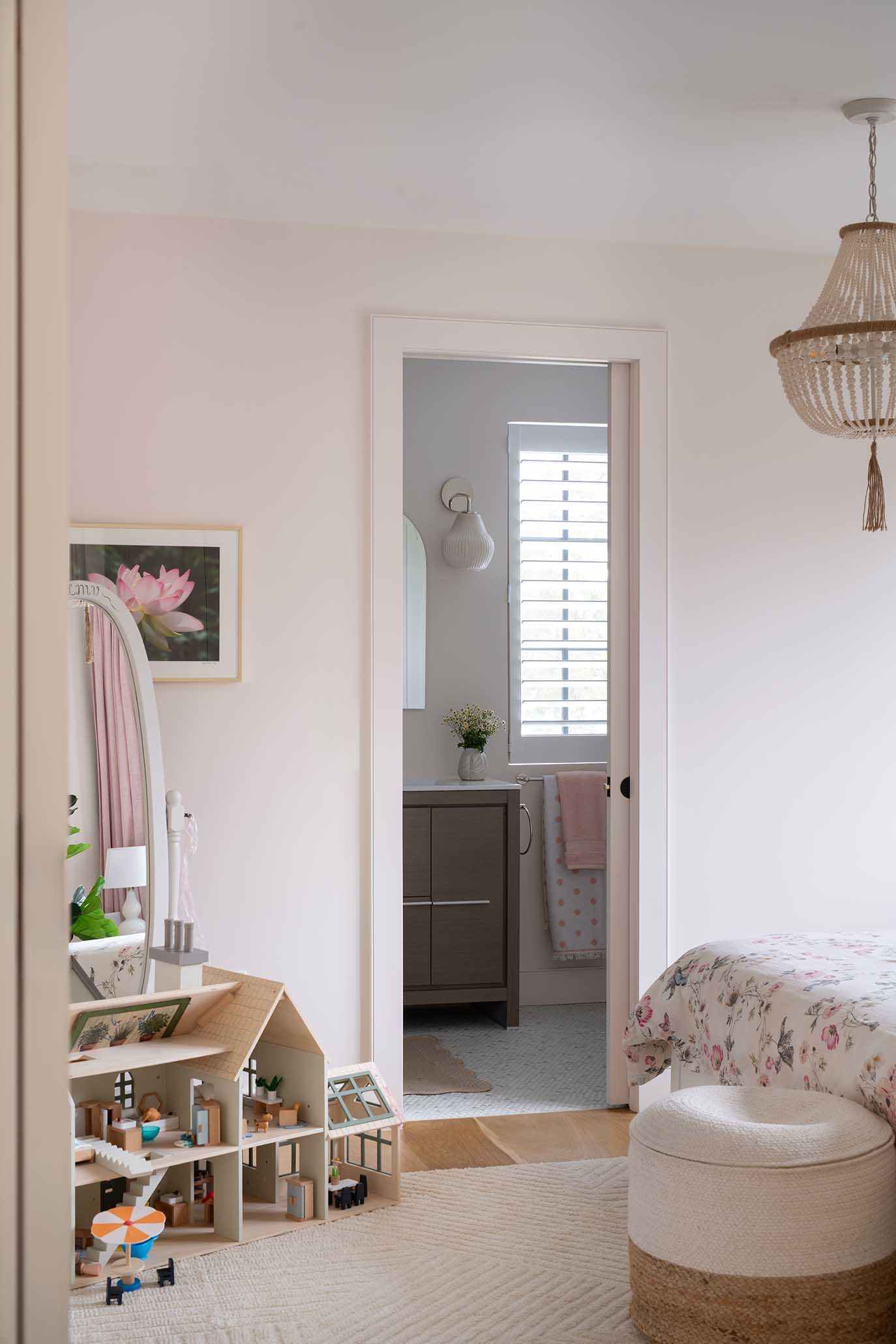 Playful and airy children's bedroom design in a custom East Greenwich home.
