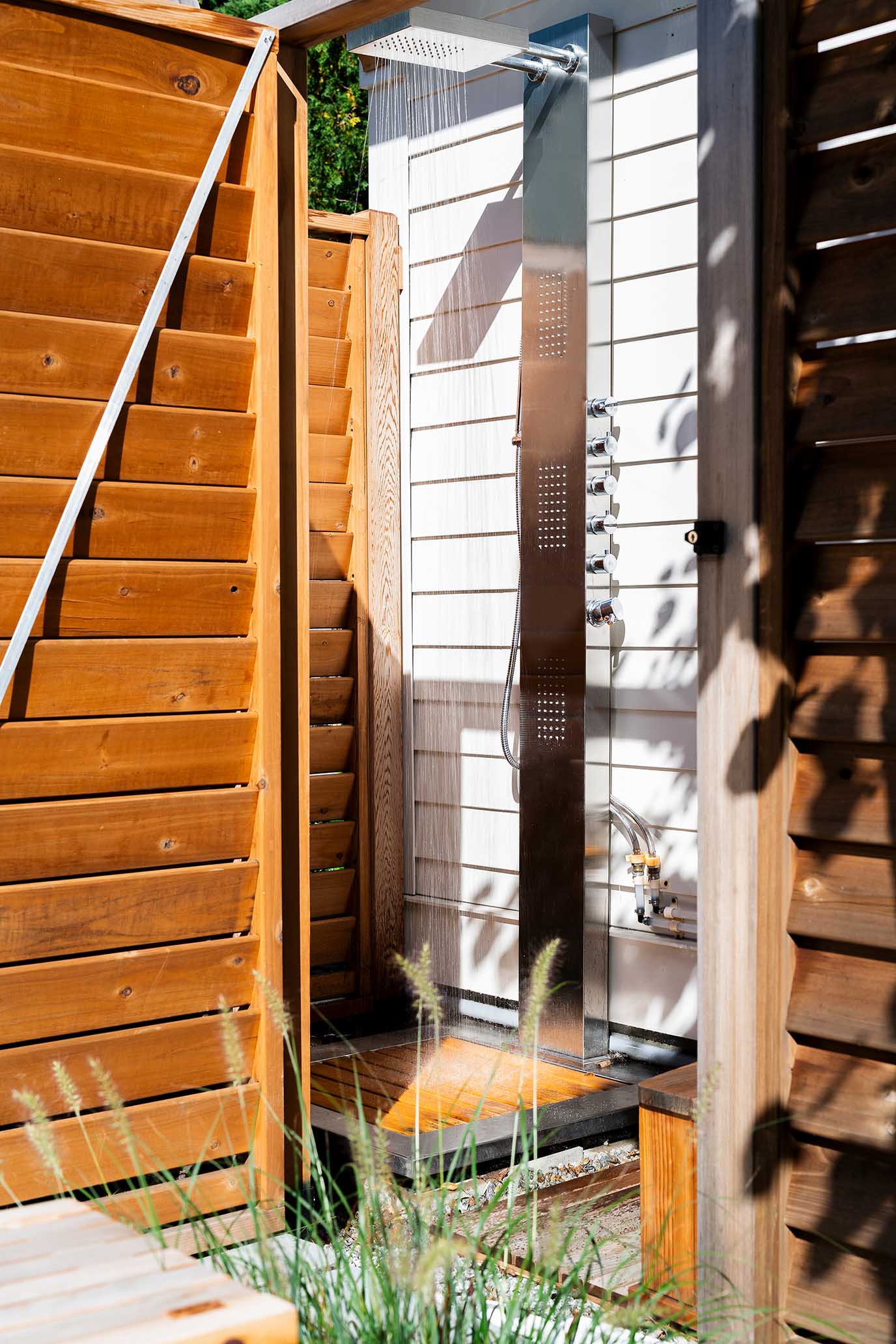 Custom cedar outdoor shower enclosure, highlighting the detailed finish work provided by Rhode Island general contractors.