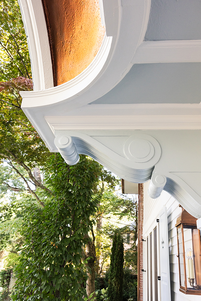 Close-up of the restored exterior cornice molding and copper gutter details.