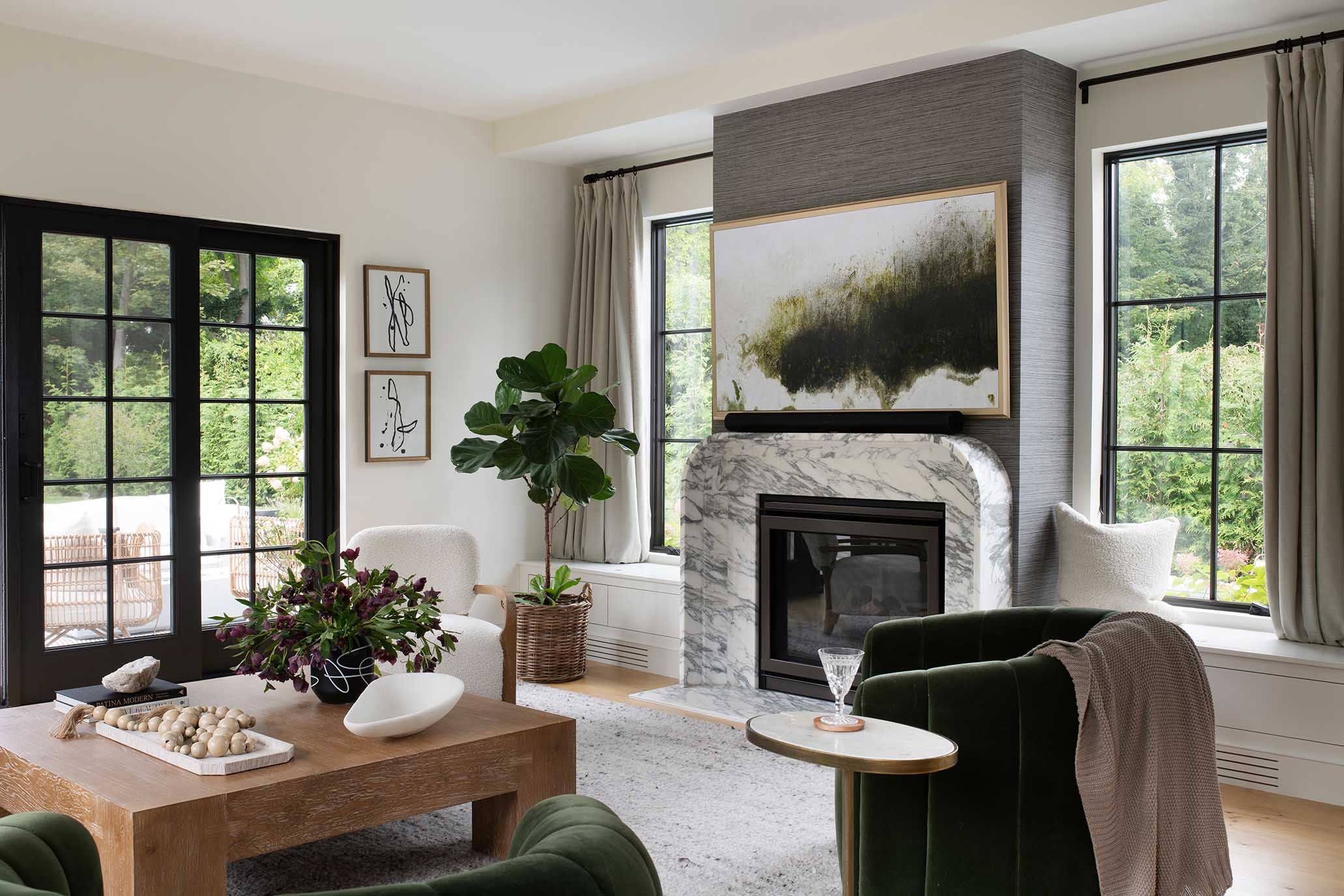 Open-concept living room with a fireplace, designed to offer the 
